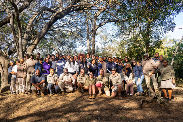 The WINS group posing with several people who helped with their travels in South Africa.